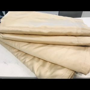 4-panels of cream color faux silk curtains